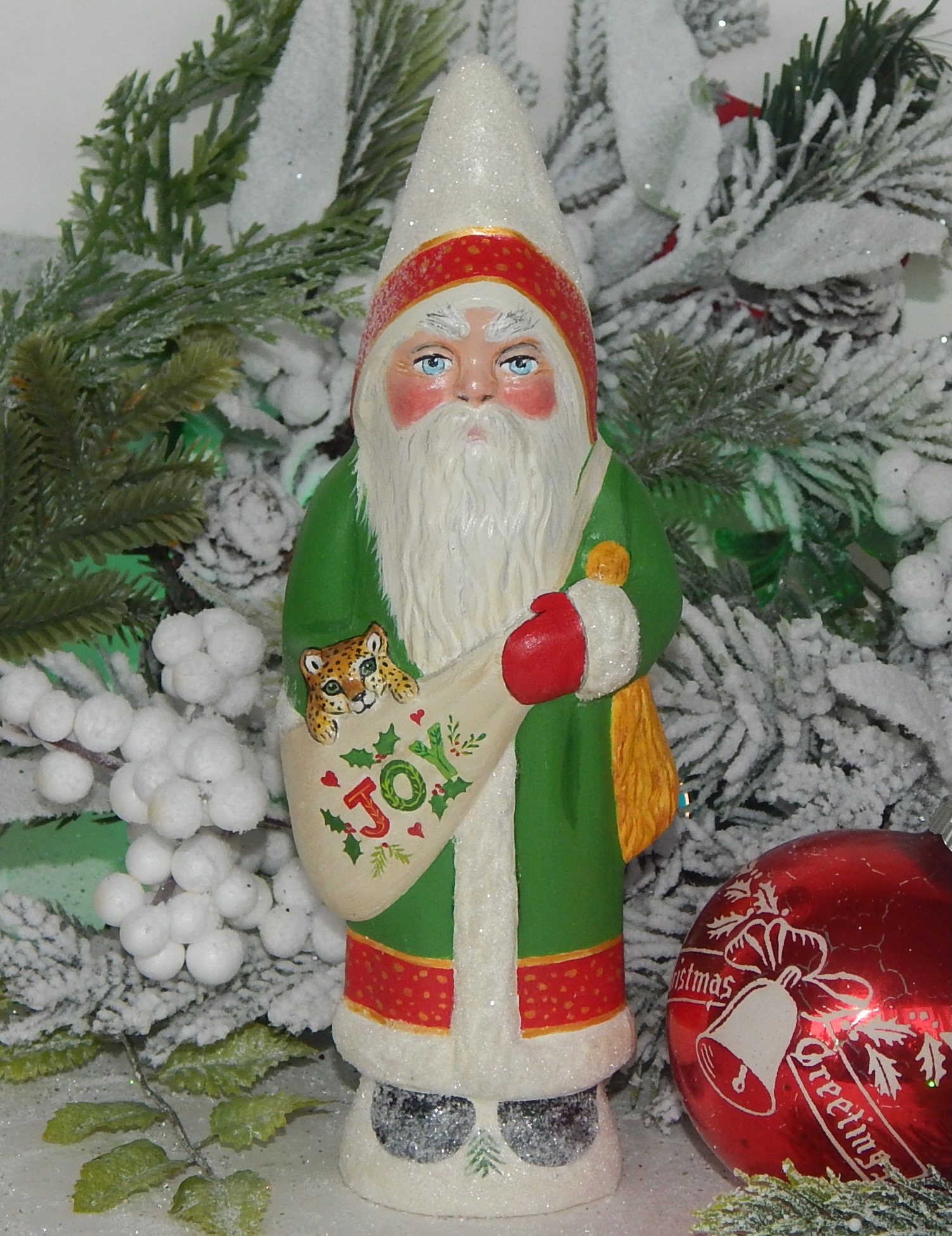 S831 chinoiserie leopard chalkware Santa in verdant green with red and gold accents